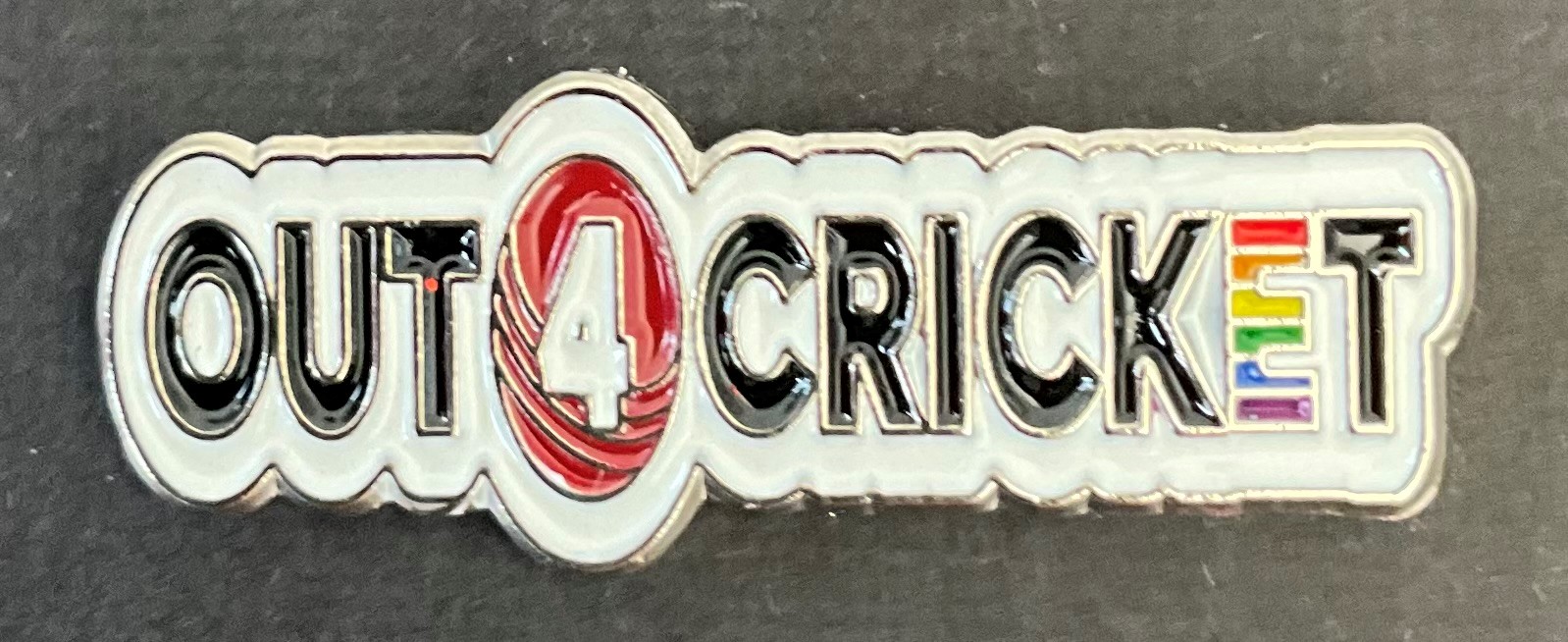 out 4 cricket badge
